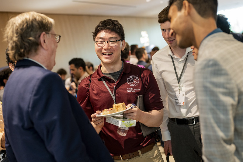 A group of people chatting at an event